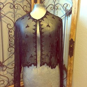 Small woman’s beaded cardigan